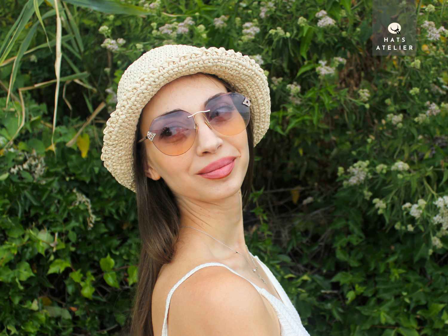 Natural straw crochet bucket hat with relaxed boho summer look
