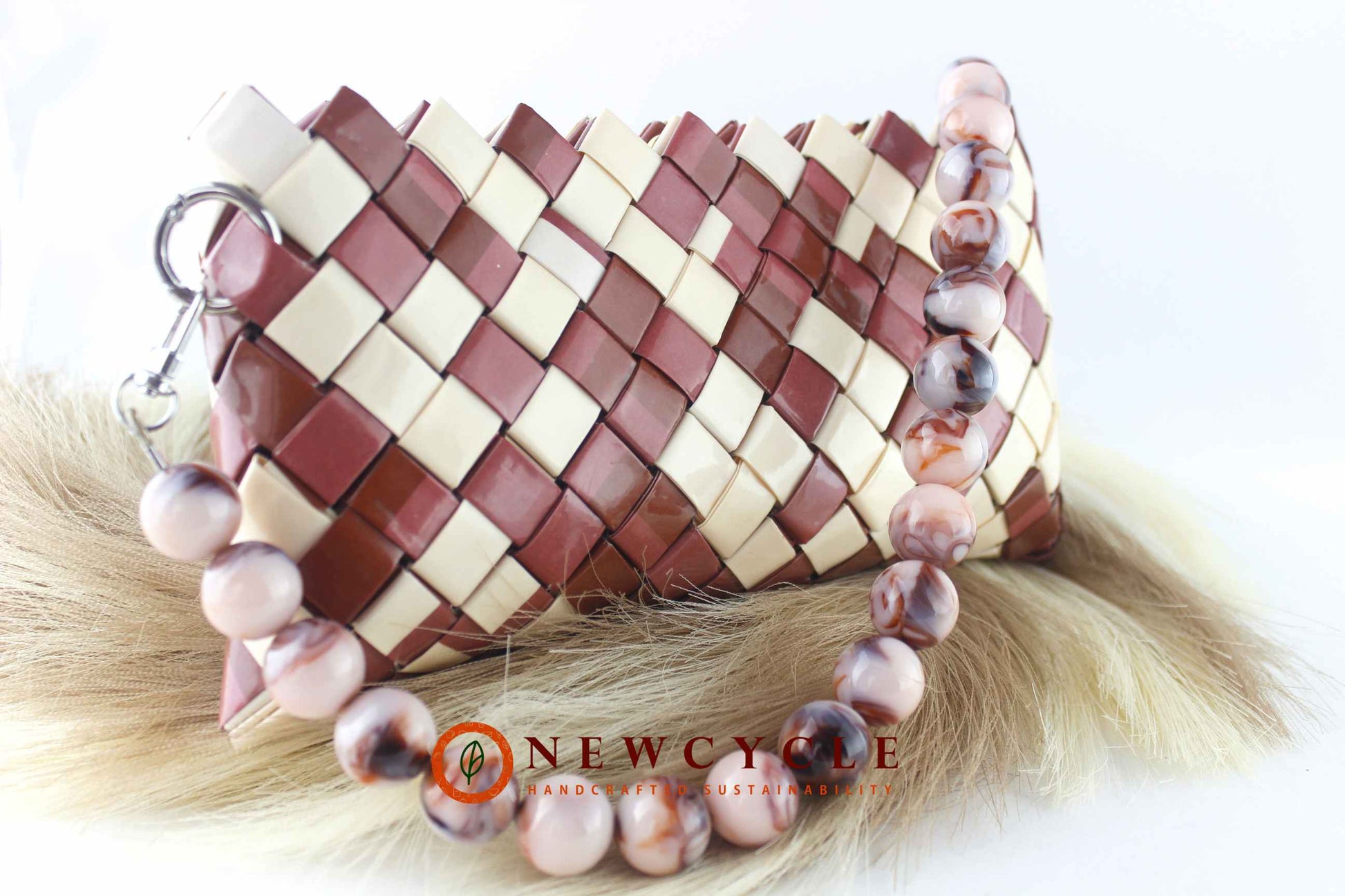 brown and cream handcrafted woven purse close-up