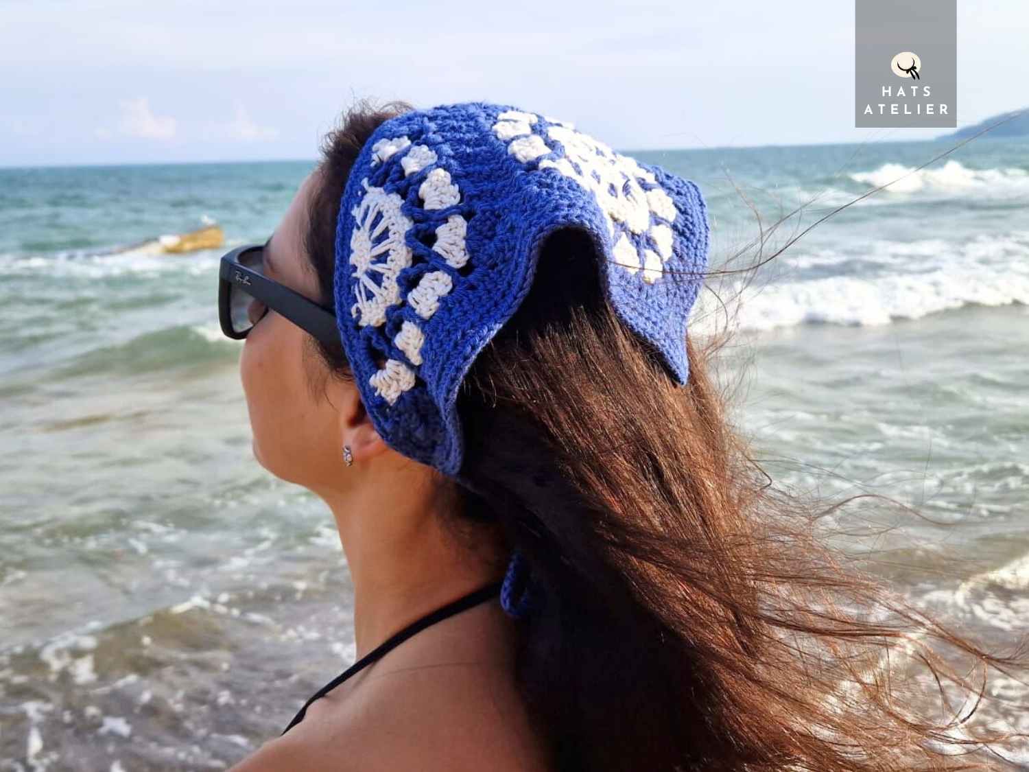 Crochet cotton boho bandana in deep blue and white with handmade floral motif