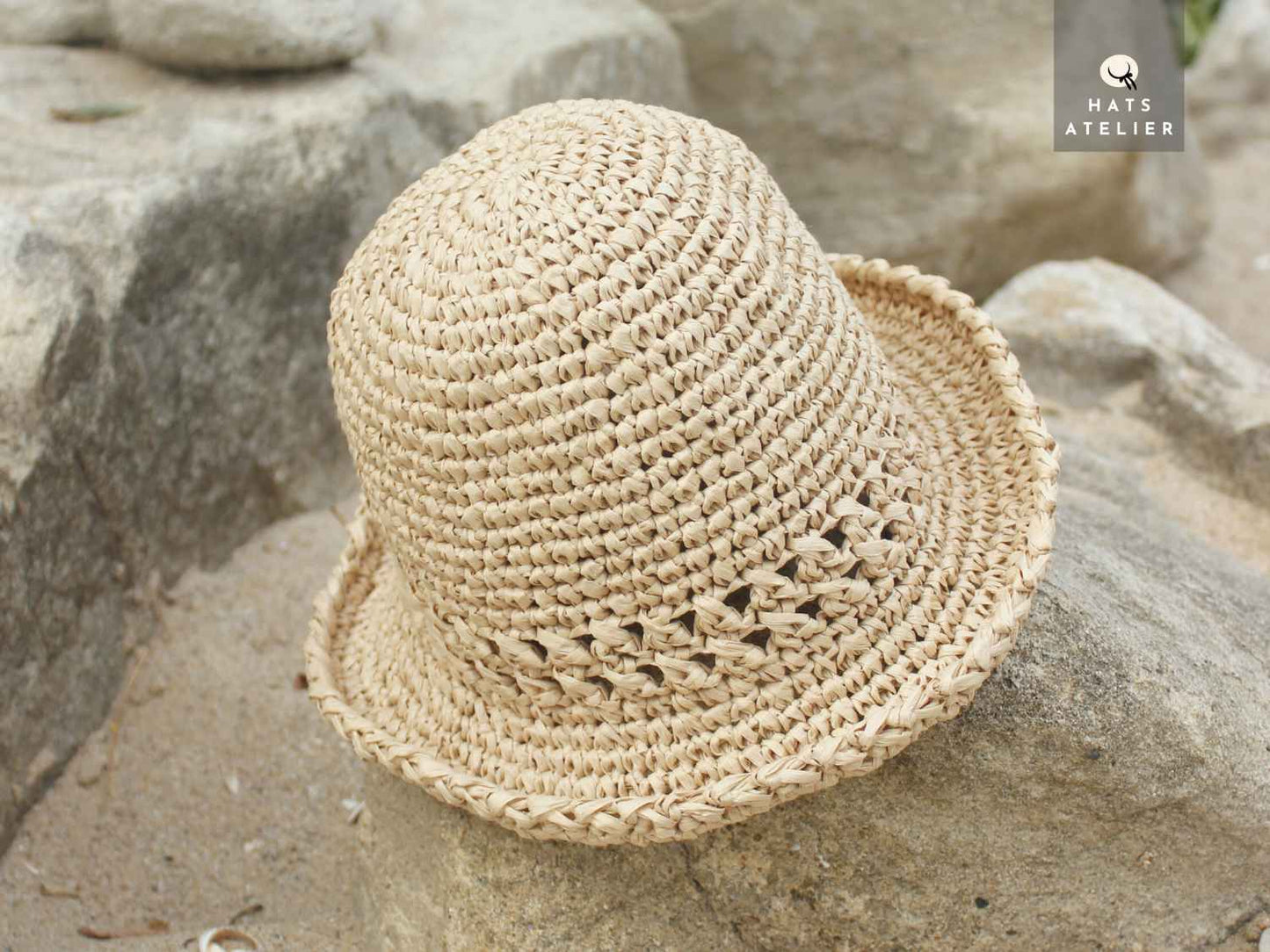 Crochet raffia bucket hat made from 100% natural straw in boho style