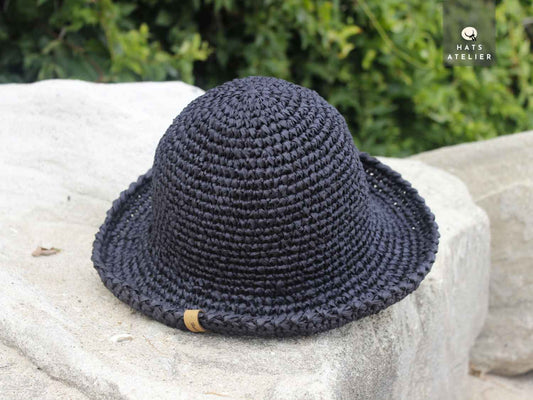 Handwoven black crochet raffia hat with medium brim