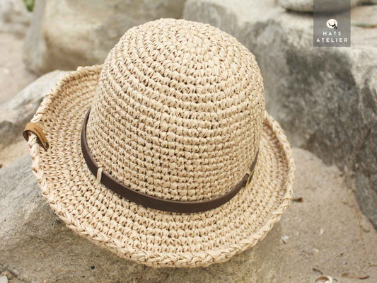 crochet raffia hat made from natural straw with medium brim