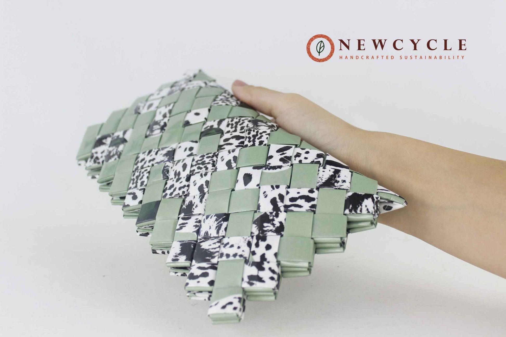 eco friendly woven clutch sage green animal print upcycled materials