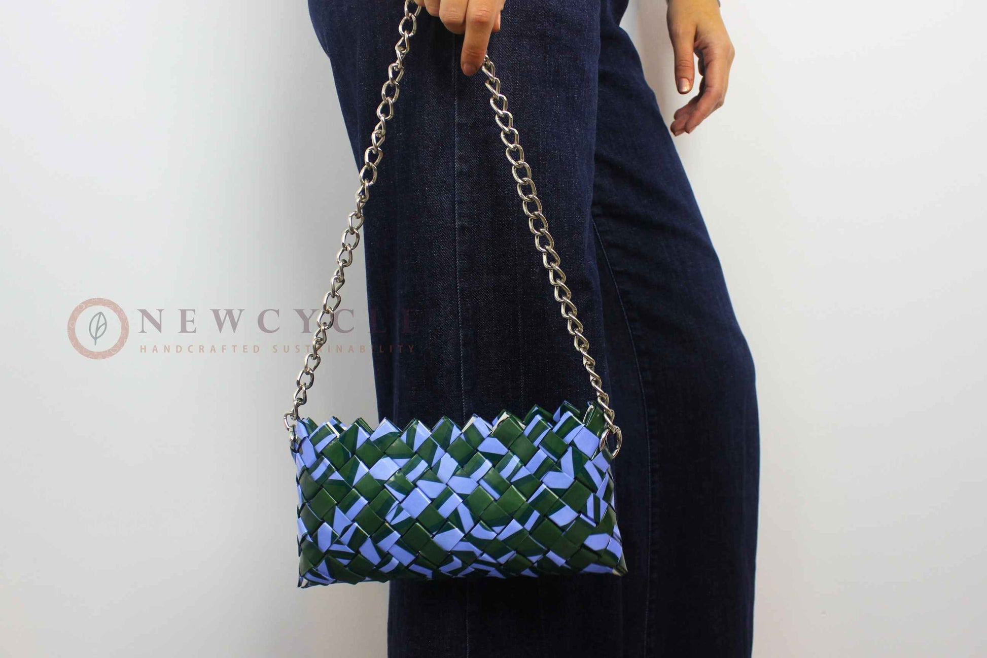 woven mosaic purse styled with denim outfit