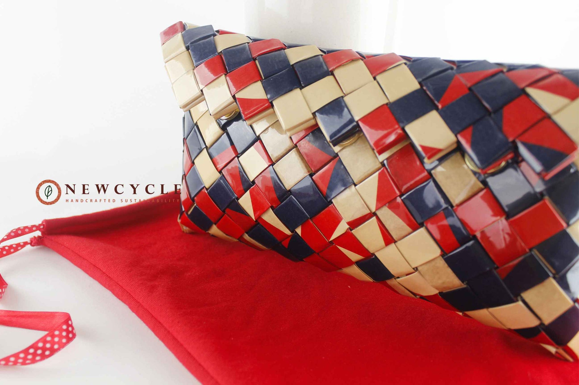 eco mosaic clutch red navy cream angled view