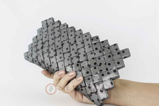 Grey polka dot woven clutch handmade from upcycled materials