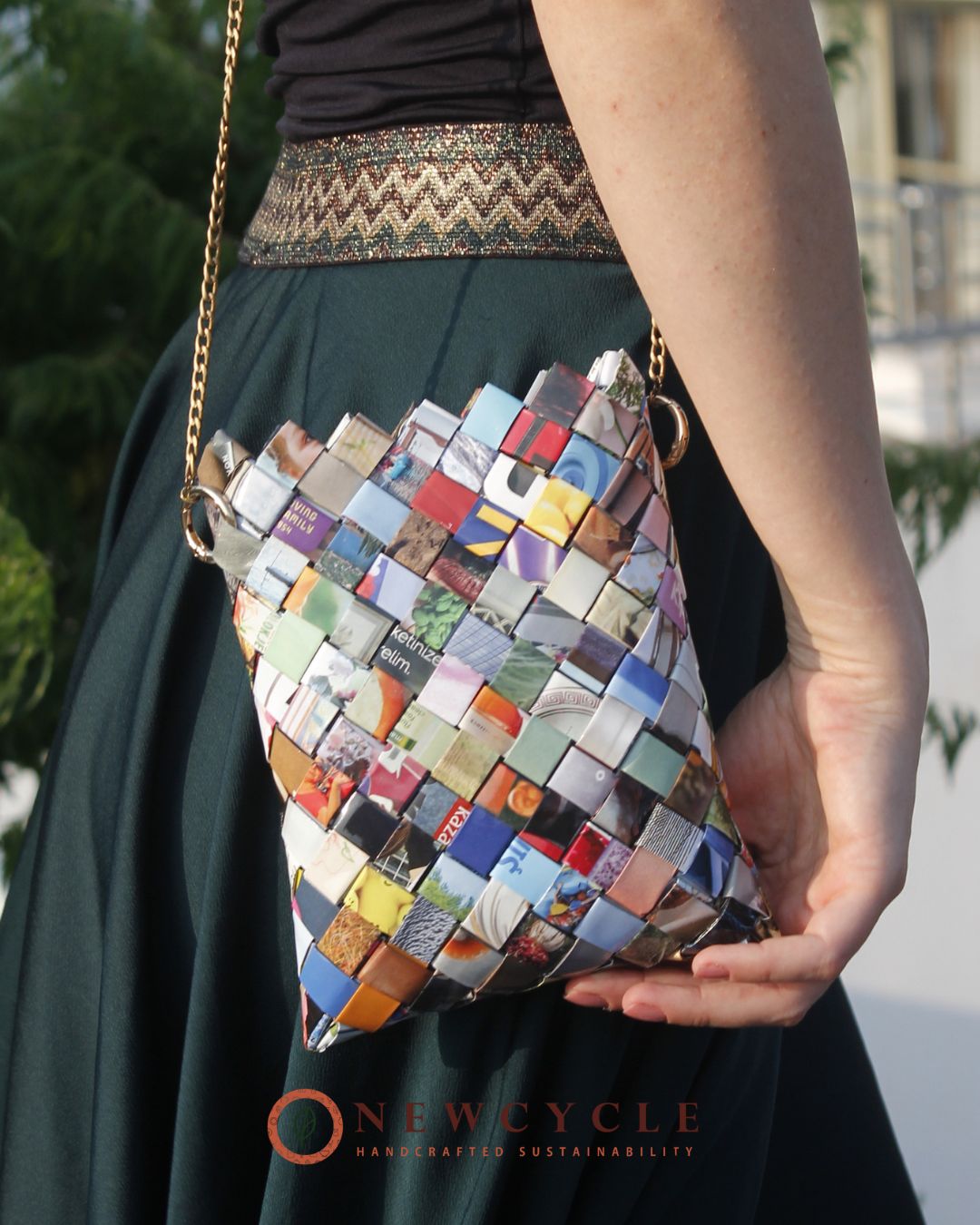 multicolor mosaic shoulder bag worn on side