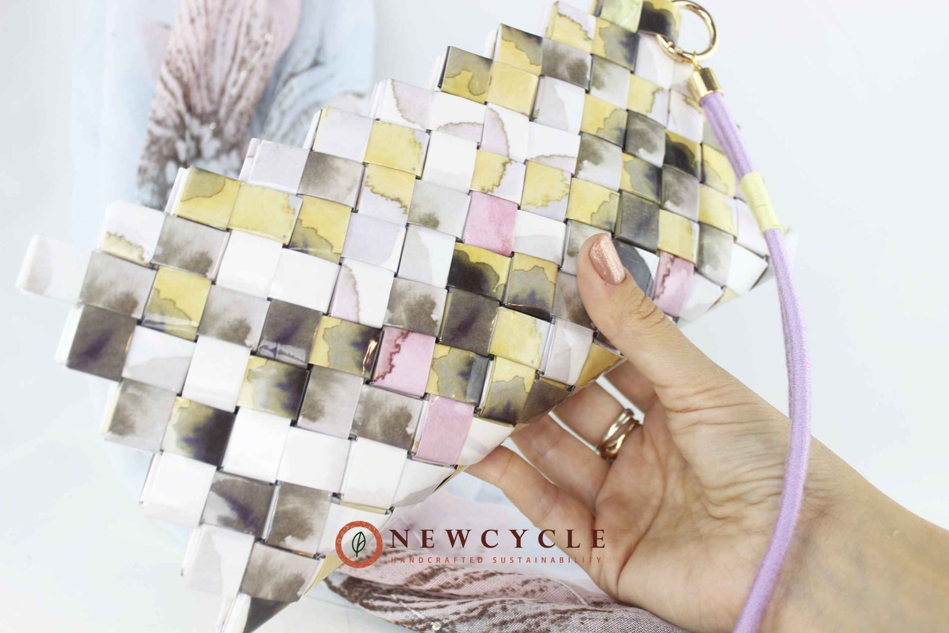 Interior view of pastel woven clutch – handmade upcycled wristlet purse