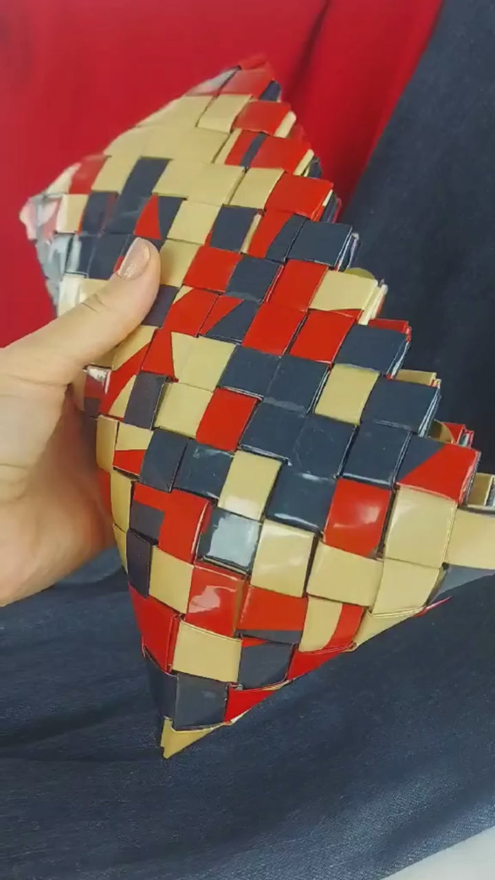 Angled view of red navy cream mosaic woven purse video
