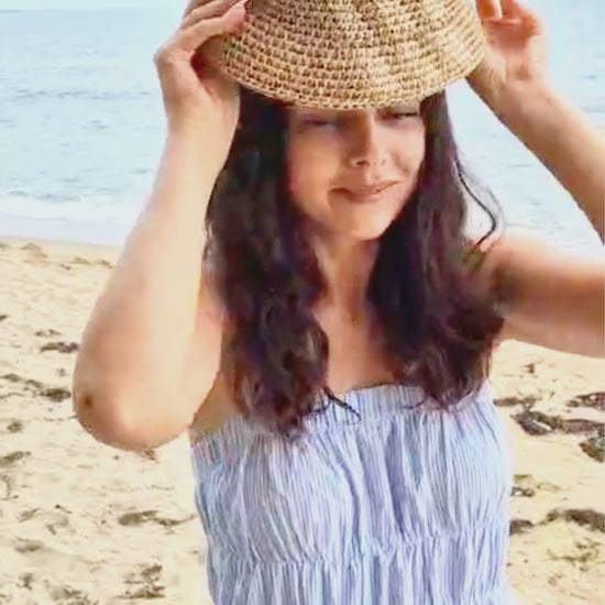 Crochet raffia bucket hat worn at the beach as a lightweight summer straw  video