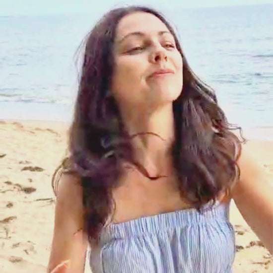 Natural straw bucket hat worn at the beach, lightweight and breathable video