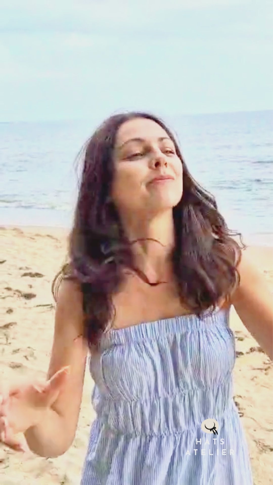 Natural straw bucket hat worn at the beach, lightweight and breathable video