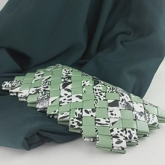 video preview woven clutch sage green with animal print mosaic