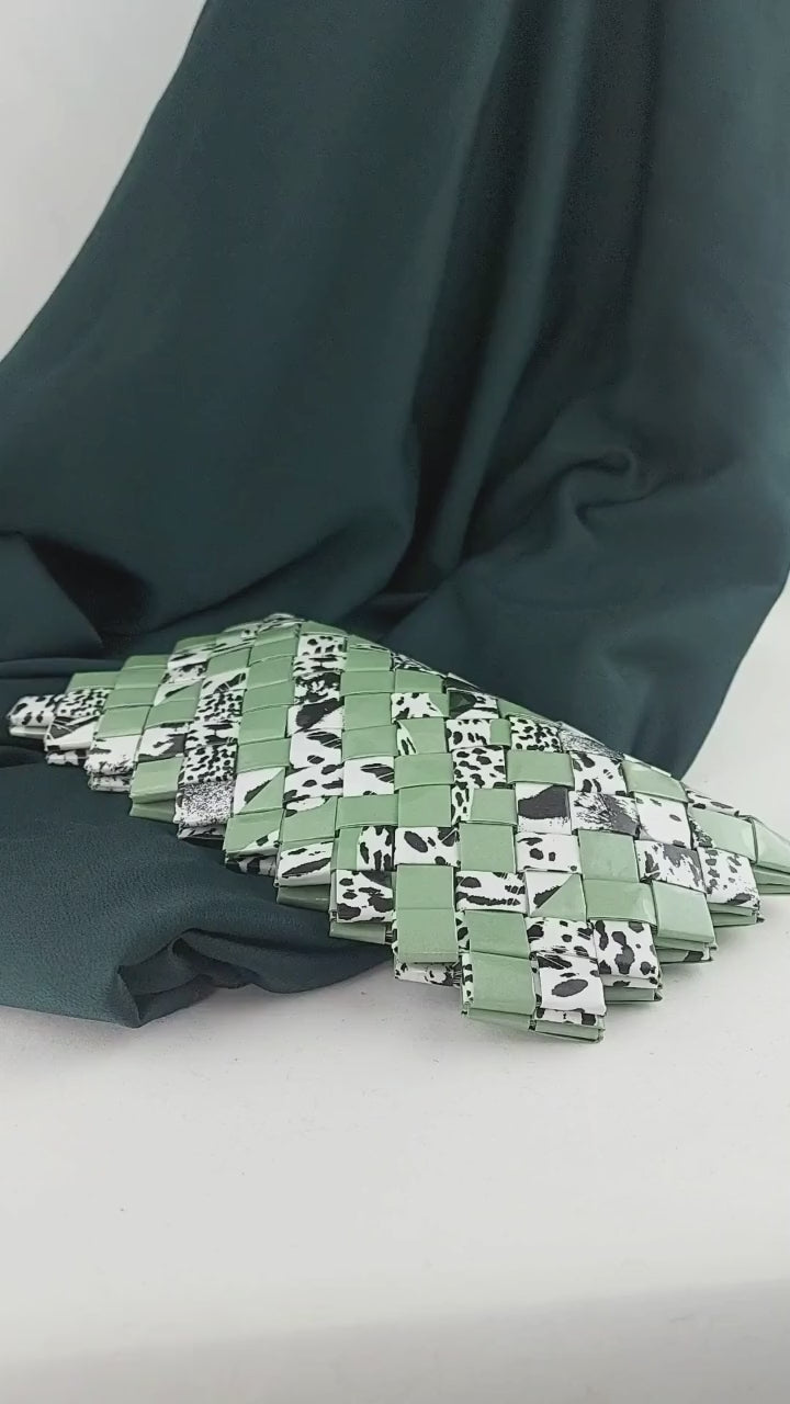 video preview woven clutch sage green with animal print mosaic