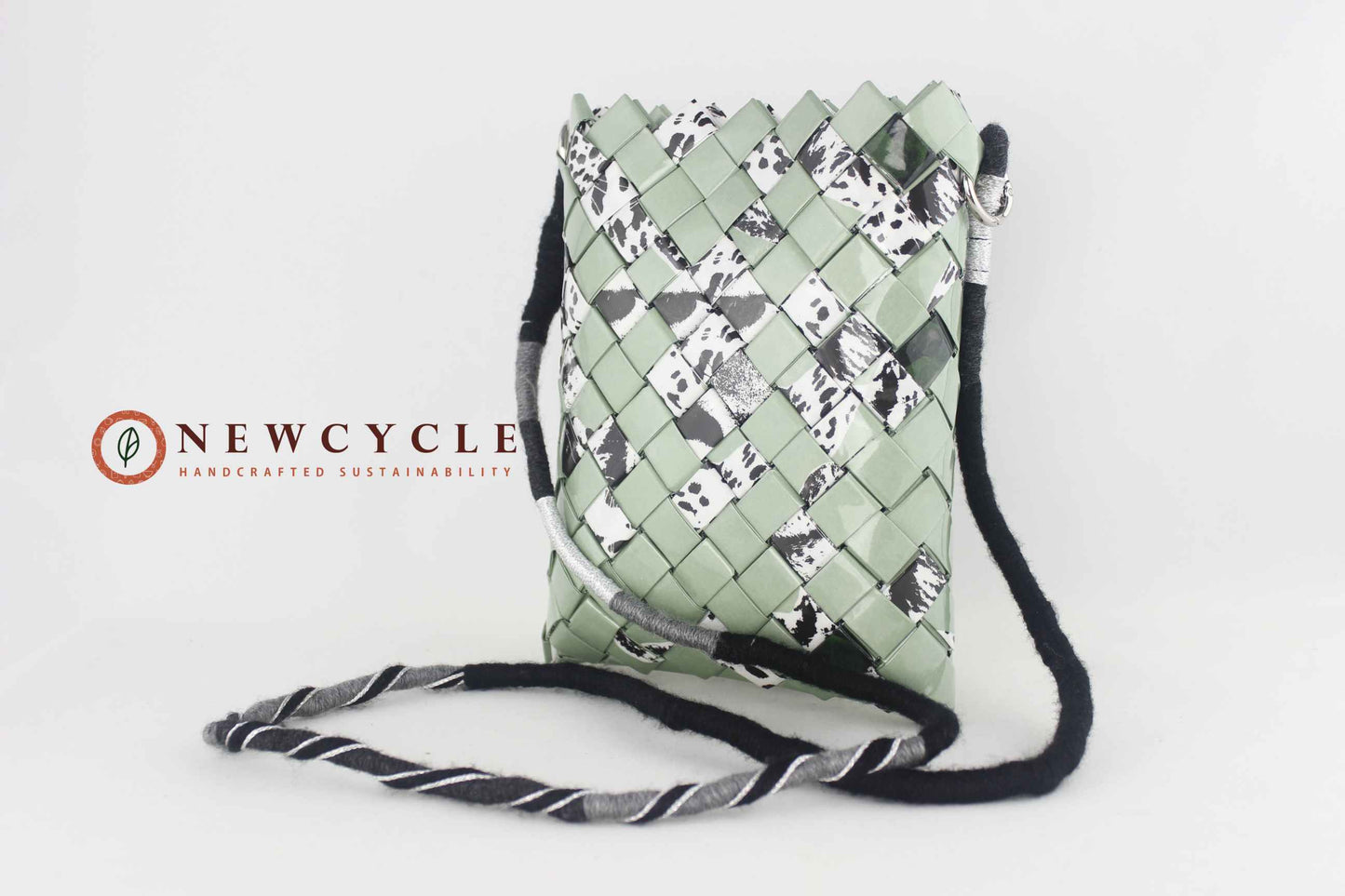 sage green animal print upcycled bag with shoulder strap