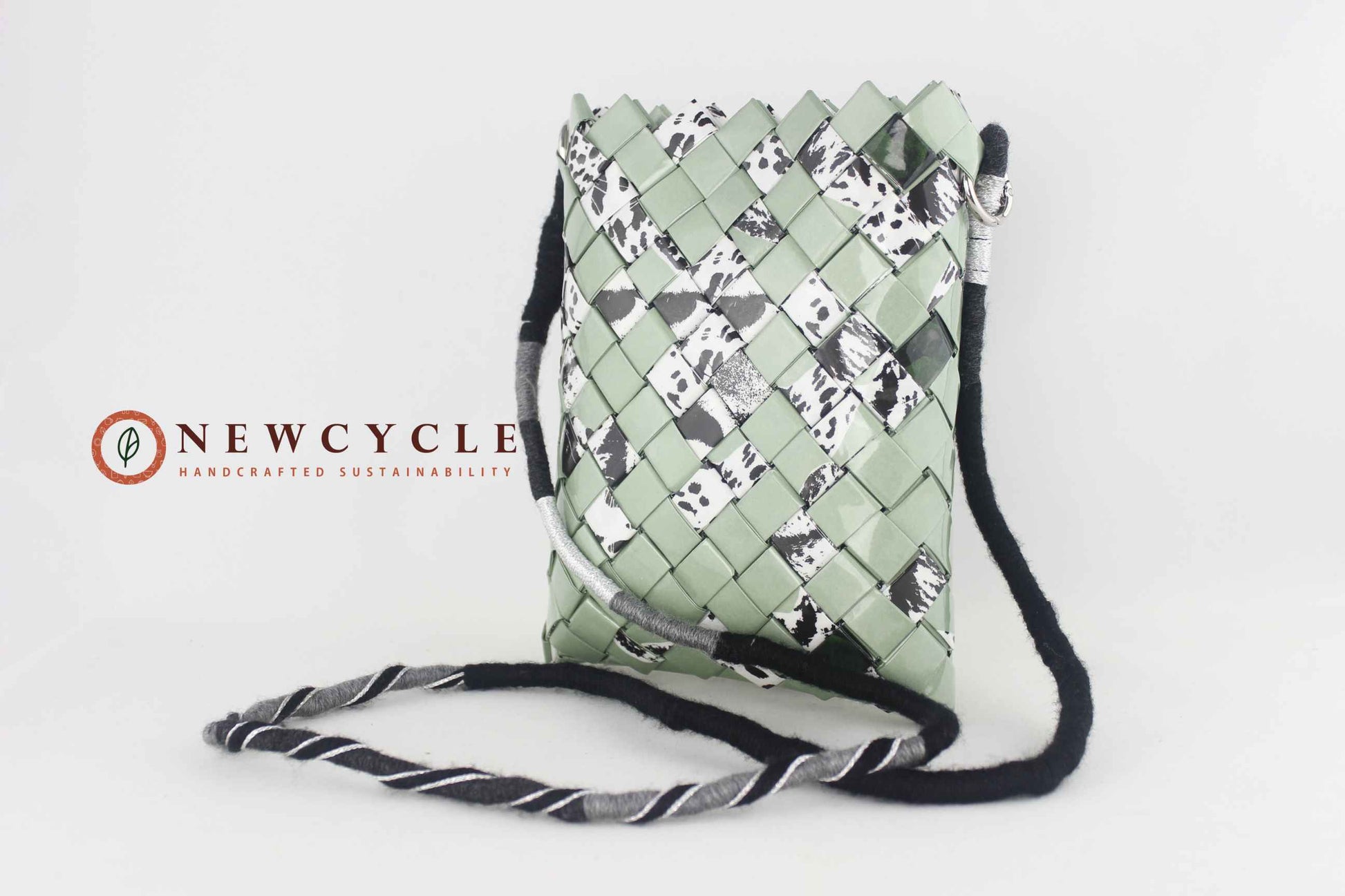 sage green animal print upcycled bag with shoulder strap