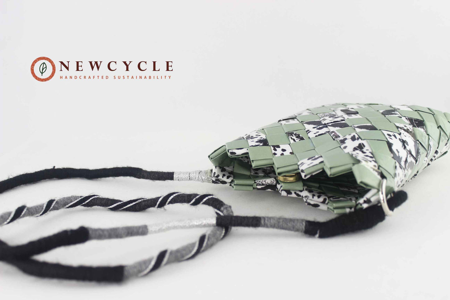 top view sage green animal print woven purse