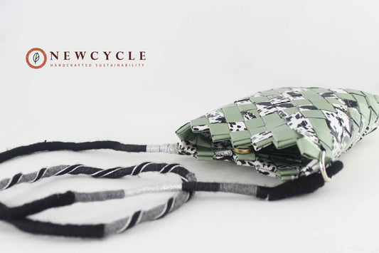 top view sage green animal print woven purse