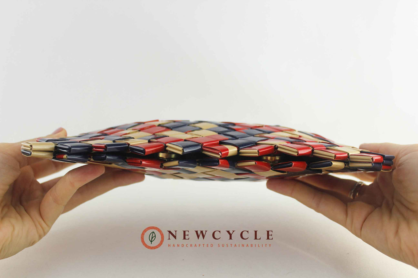 sculptural woven clutch minimalist style