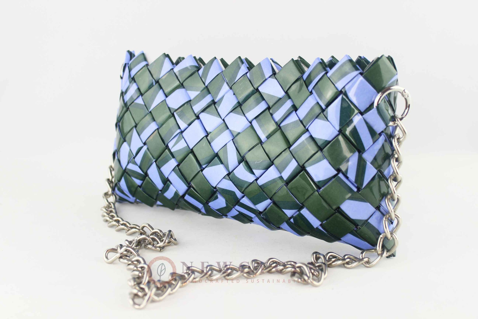 green lilac sustainable woven purse with metal chain