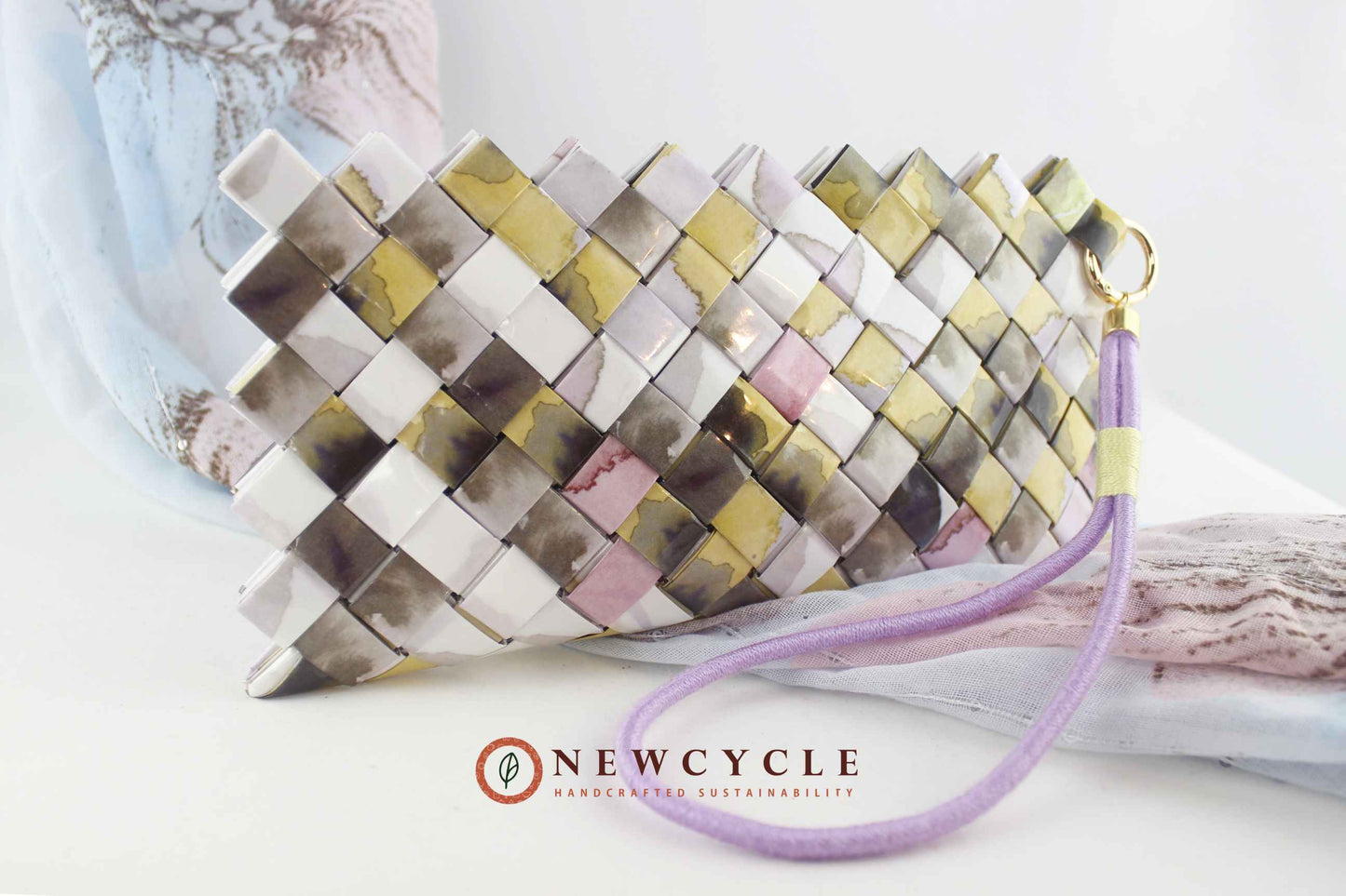 Upcycled pastel woven clutch with lavender wristlet strap – handmade mosaic bag