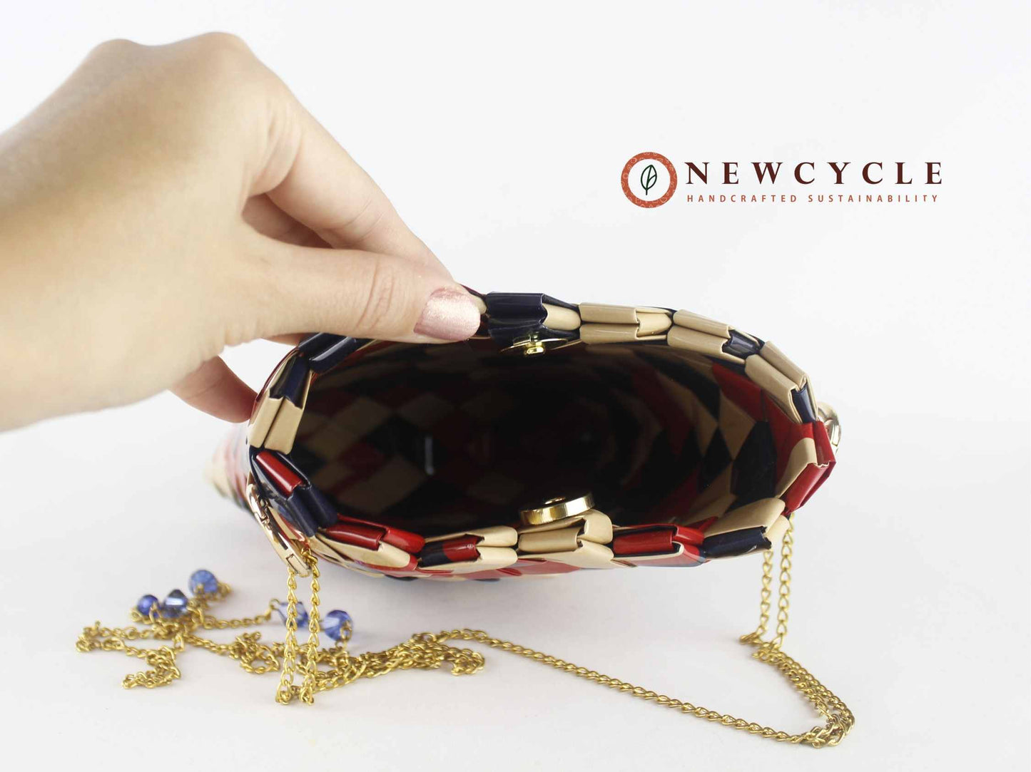 Interior view of handwoven red navy beige purse with gold chain strap