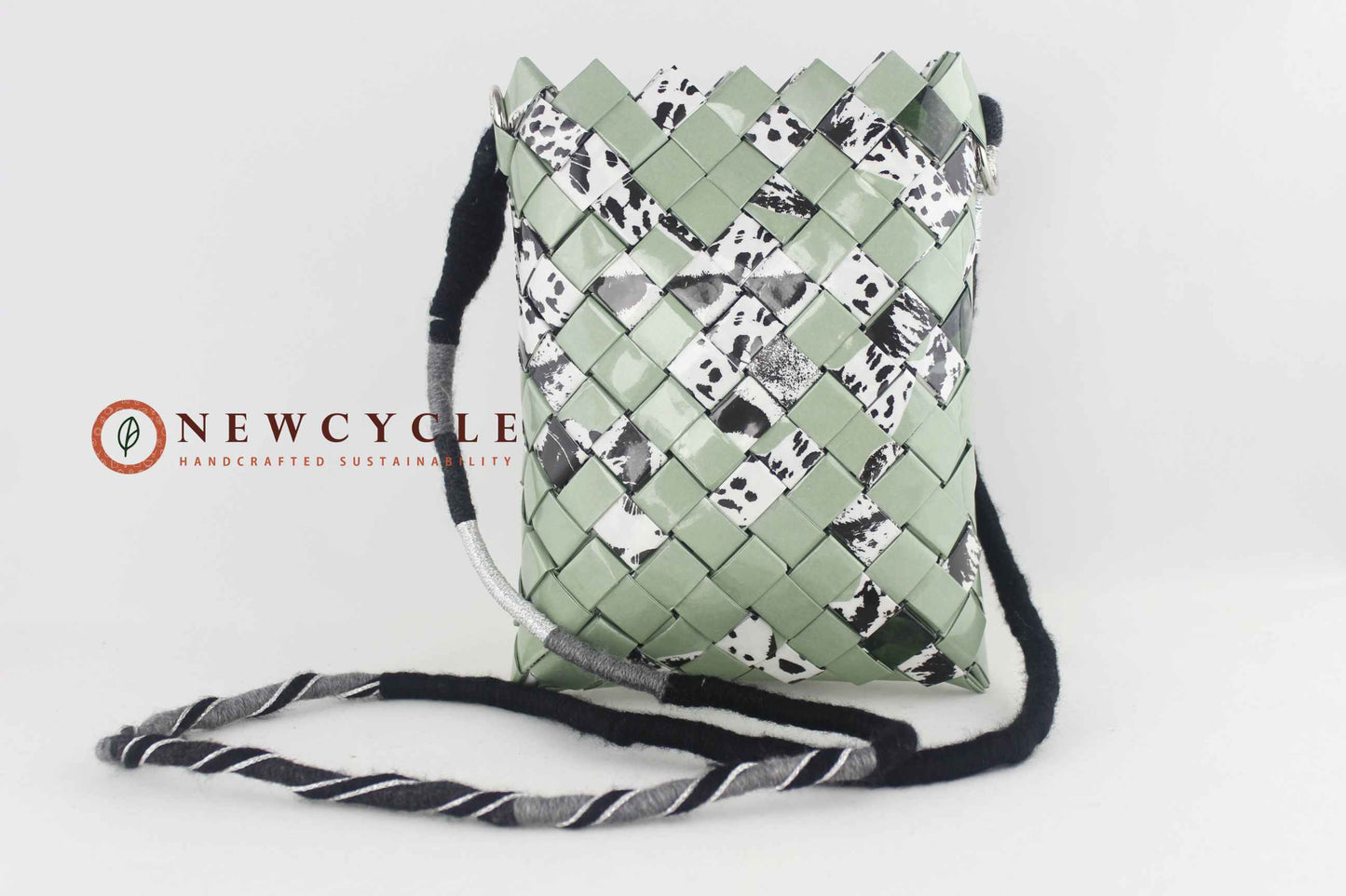 woven shoulder bag sage green animal print front view